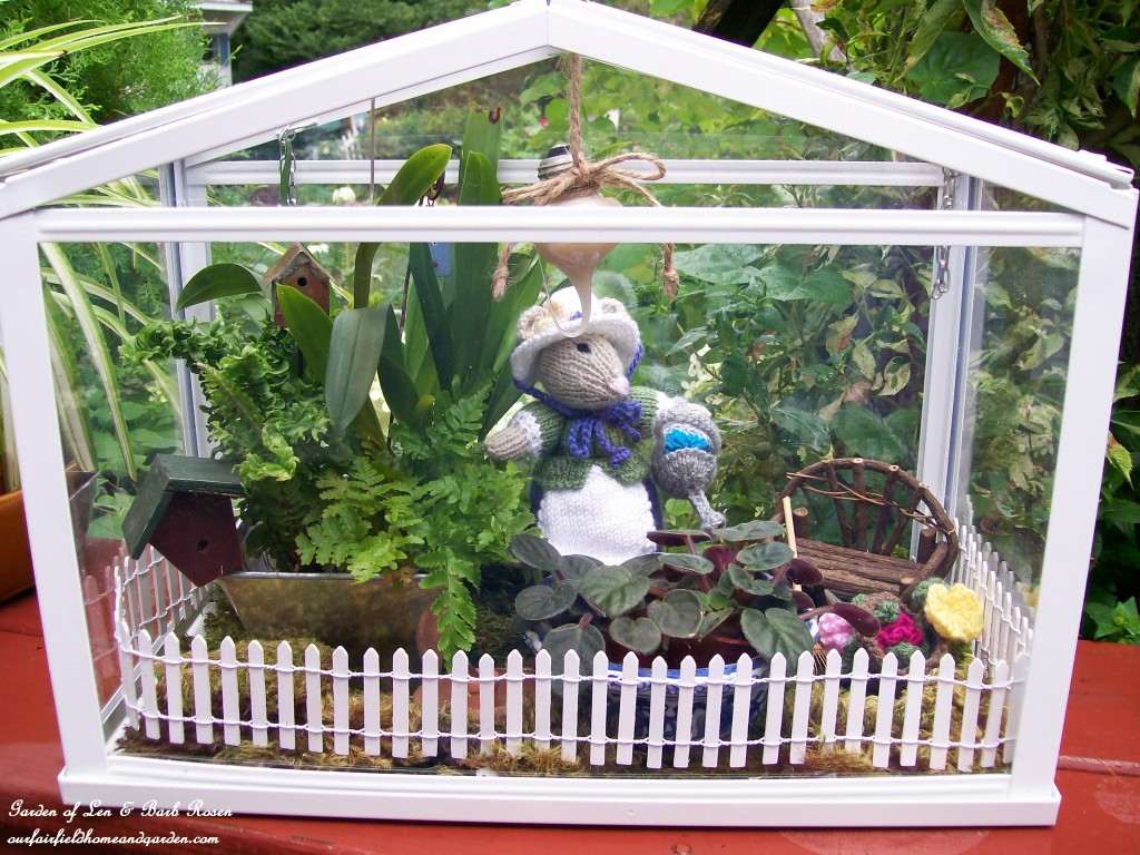 Miss Millicent Mouse in her greenhouse. https://lolajack-global.jp.net/featured-artist-bonnie-johnson-fabric-artist/