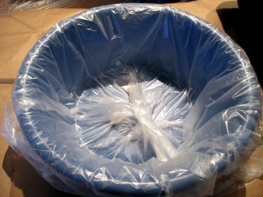 Step #  ~ Slip the container into a plastic trash bag