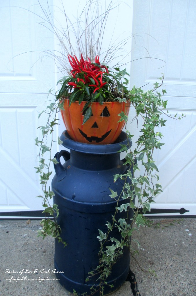 Fall planter on a milk can stand https://lolajack-global.jp.net/fall-outdoor-decor-our-fairfield-home-and-garden/