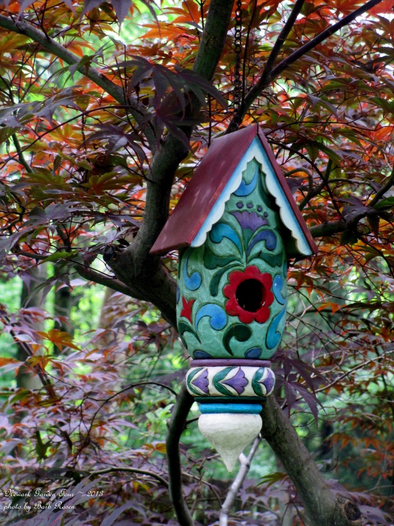 Colorful Carved Birdhouse https://lolajack-global.jp.net/unexpected-garden-accents/